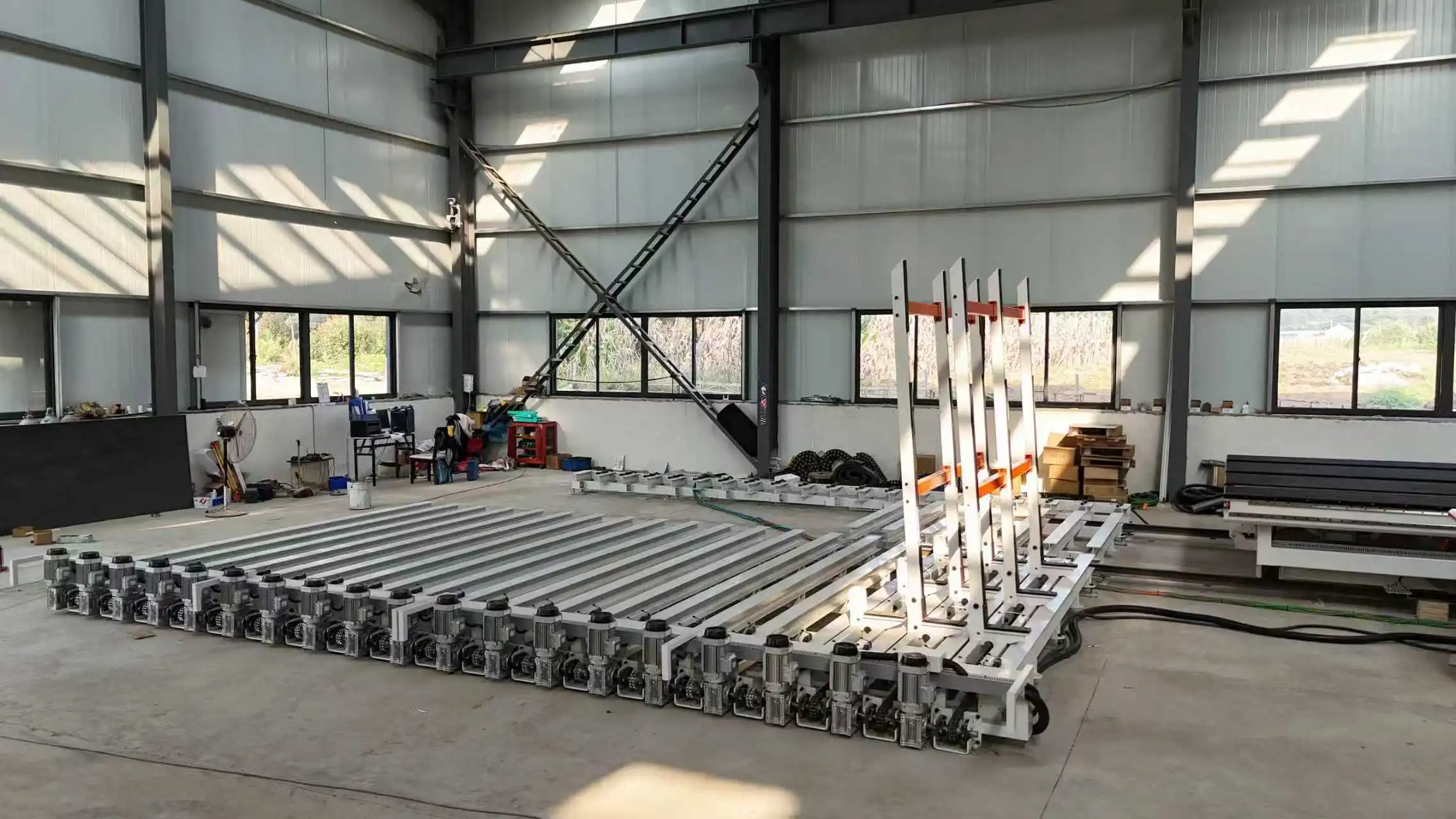 How has mirror loading and cutting machine technology evolved?