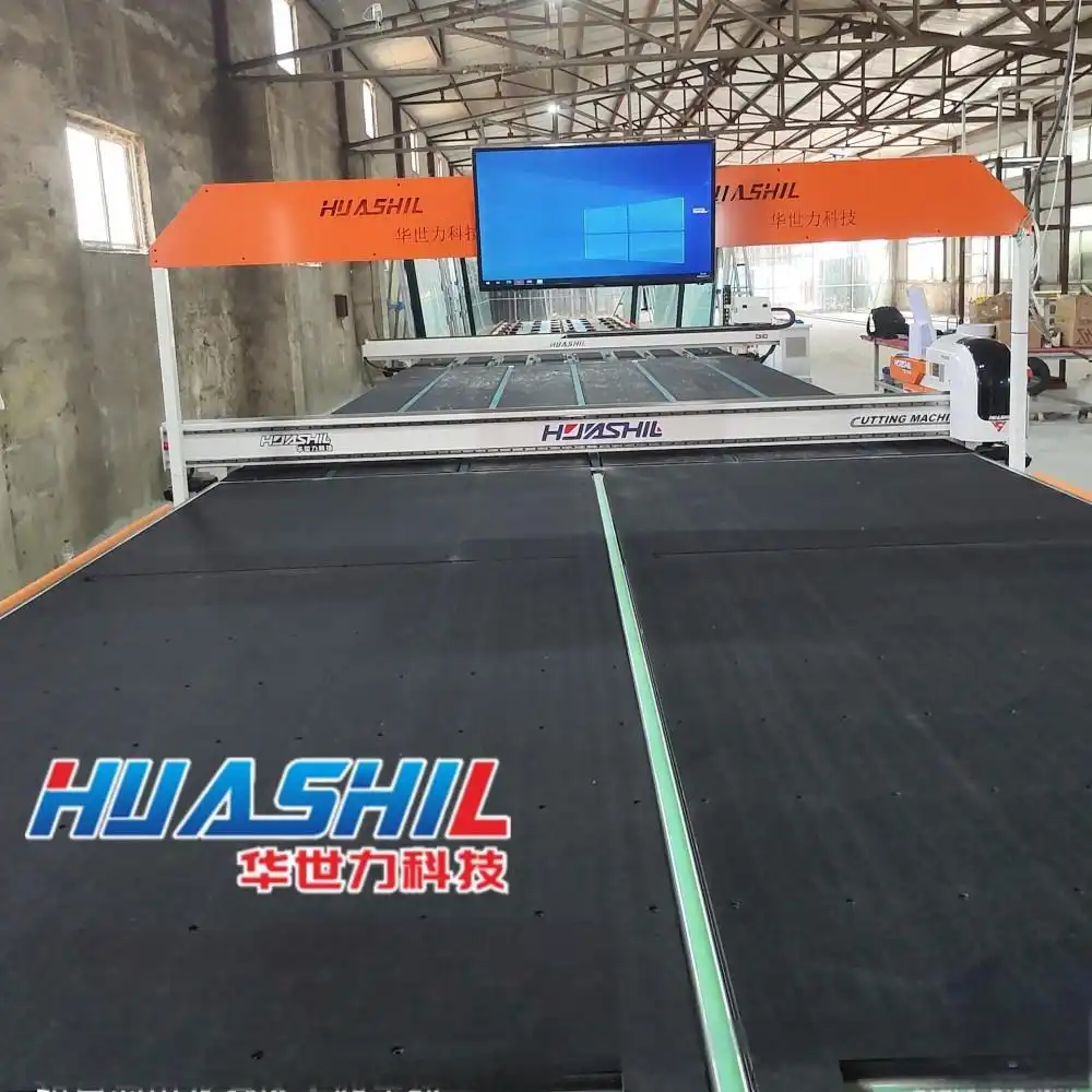 Ποια είναι τα βασικά στοιχεία ενός συστήματος κοπής γυαλιού CNC;